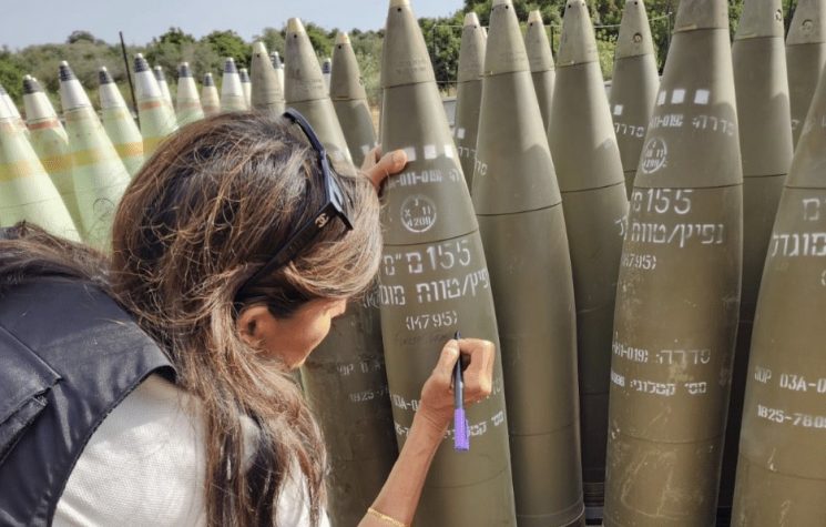 Neocon Nikki signs Israeli bombs urging Israel to kill Palestinian civilians